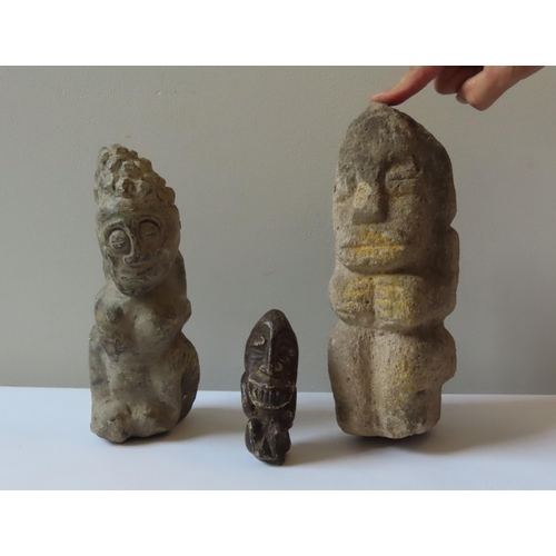 89 - AN AFRICAN CARVED STONE SEATED FIGURE, another African carved stone figure and a smaller example.27 ... 