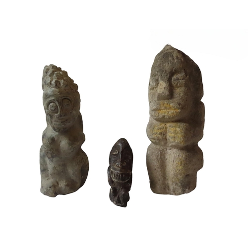 89 - AN AFRICAN CARVED STONE SEATED FIGURE, another African carved stone figure and a smaller example.27 ... 