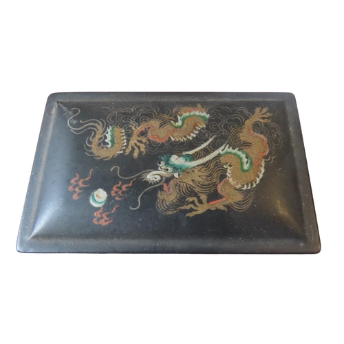 130 - A CANTONESE CARVED WOOD CARD CASE, a sodalite carved lion, a glass snuff bottle, an Indian enamelled... 