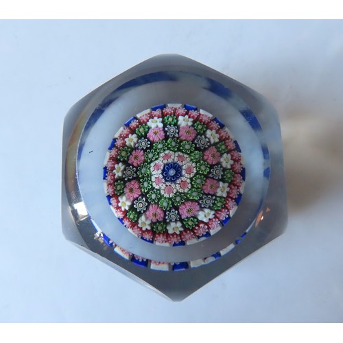 322 - A FACETED BLUE STRIPED BACCARAT-STYLE MILLEFIORE PAPERWEIGHT