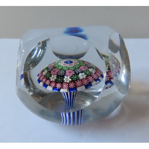 322 - A FACETED BLUE STRIPED BACCARAT-STYLE MILLEFIORE PAPERWEIGHT