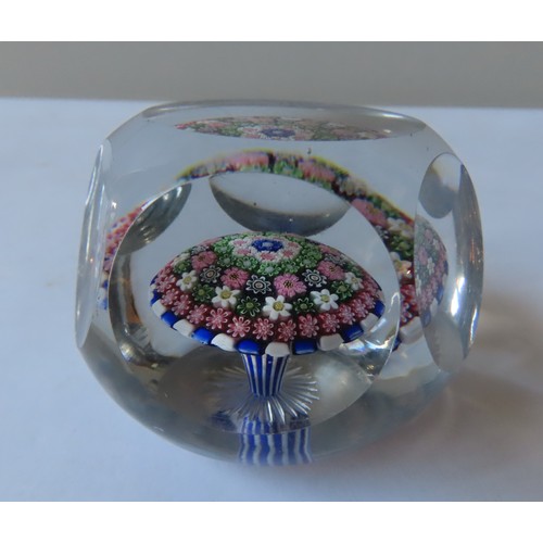 322 - A FACETED BLUE STRIPED BACCARAT-STYLE MILLEFIORE PAPERWEIGHT