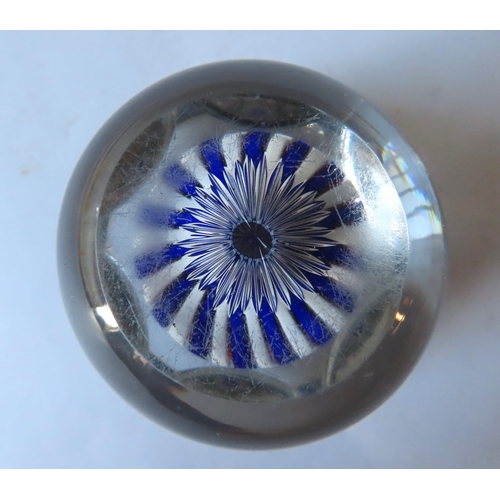 322 - A FACETED BLUE STRIPED BACCARAT-STYLE MILLEFIORE PAPERWEIGHT