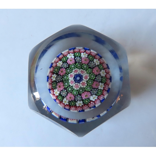 322 - A FACETED BLUE STRIPED BACCARAT-STYLE MILLEFIORE PAPERWEIGHT