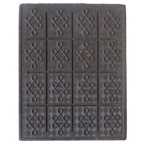 610 - A CHINESE HUBEI TEA BRICK24 x 29 cms