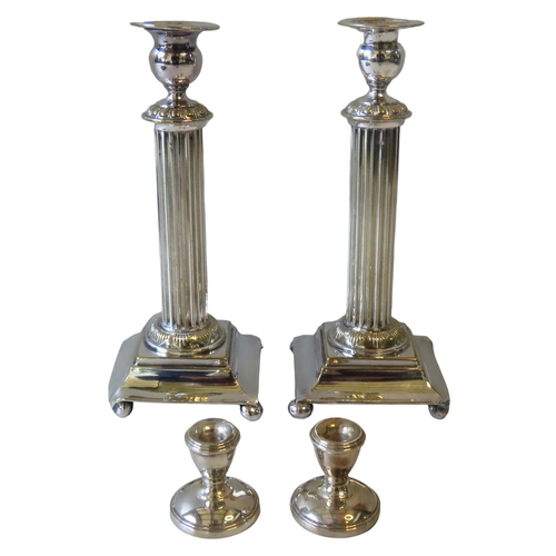 575 - A PAIR OF SILVER DWARF CANDLESTICKS, on domed circular weighted bases, marked Birmingham 1981 (4.5 c... 