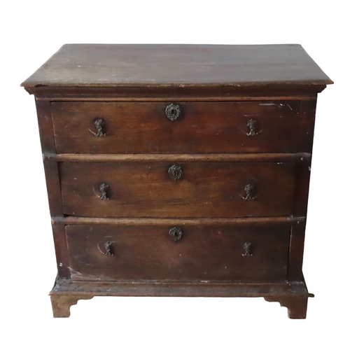 52 - A GEORGE III FRUITWOOD BACHELOR'S CHEST, moulded edge rectangular top over three graduated long draw... 