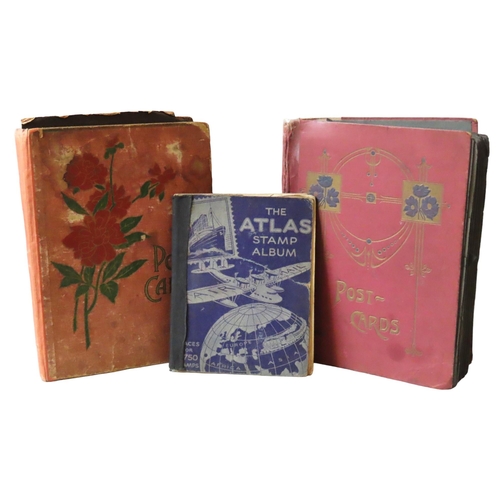 495 - TWO VINTAGE POSTCARD ALBUMS AND AN ATLAS STAMP ALBUM, the postcard albums containing numerous cards ... 