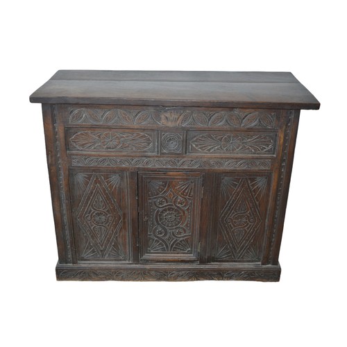 9 - AN OAK LIFT-TOP CUPBOARD, 19TH CENTURY, the associated rectangular hinged top lifting to reveal shal... 