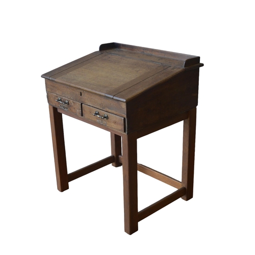 624 - A 19TH CENTURY MAHOGANY CLERKS DESK ON LATER STAND, the sloped writing surface opening to reveal int... 