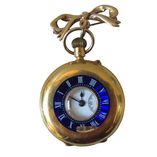 603 - AN EDWARDIAN GOLD HALF HUNTER FOB WATCH, the blue enamel mounted cover opening to reveal a 25 mm whi... 