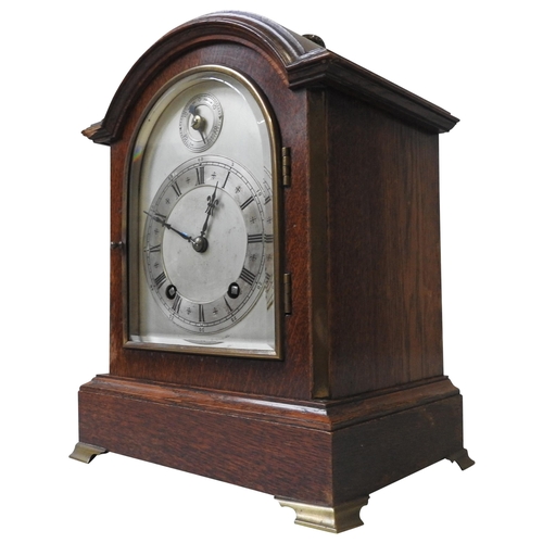 178 - A WINTERHALDER & HOFMEIR EARLY 20TH CENTURY OAK CASED BRACKET CLOCK, ting tang movement on two g... 