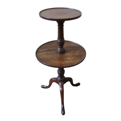 9 - A 19TH MAHOGANY DUMB WAITER, two graduated circular tiers raised on a central turned baluster column... 