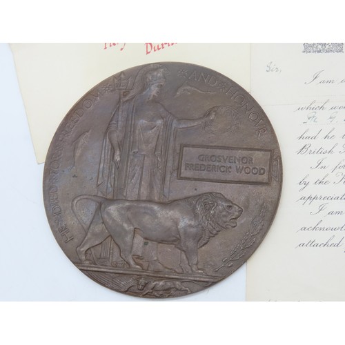 438 - A FIRST WORLD WAR COMMEMORATIVE PLAQUE, with associated Victory medal, cap badge, photograph and pap... 