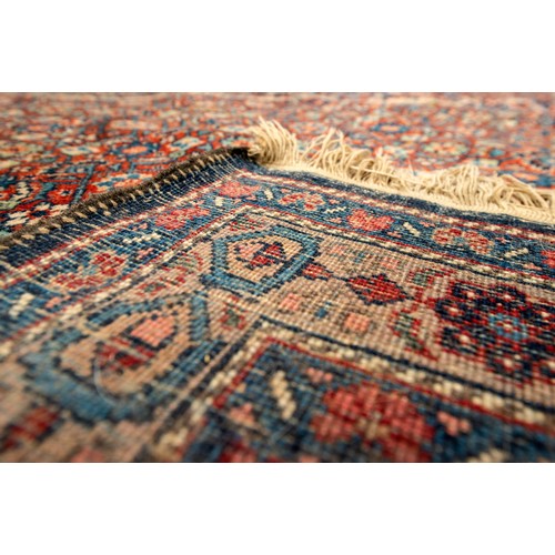 157 - A LARGE HAND WOVEN BIDJAR CARPET, central lozenge form medallion enclosed by alternating red and blu... 