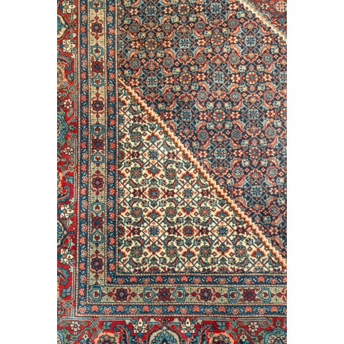 157 - A LARGE HAND WOVEN BIDJAR CARPET, central lozenge form medallion enclosed by alternating red and blu... 