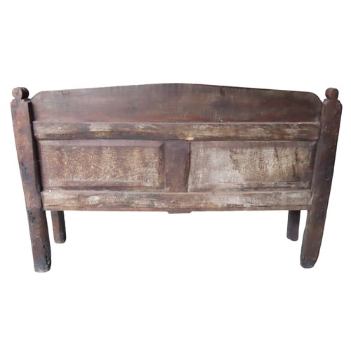 21 - A SPANISH PANELLED BENCH SETTLE, 19TH CENTURY, rustic pegged construction 106 x 170 x 47 cmRustic pe... 