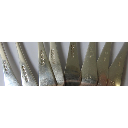 690 - A MIXED GROUP OF EIGHT GEORGIAN AND EARLY VICTORIAN SILVER TABLE FORKS, three bearing monograms, all... 