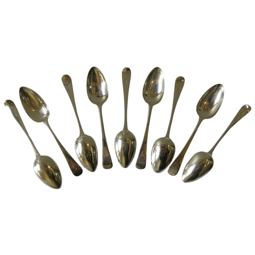 693 - A GROUP OF FOUR GEORGIAN SILVER LARGE TABLE SPOONS, marked London 1806 (21.5 cm long, 277 grams)toge... 