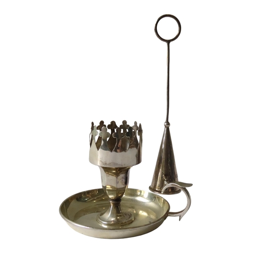 655 - AN EDWARDIAN SILVER CHAMBERSTICK, with a crown form sconce raised on an octagonal pillar, on a circu... 