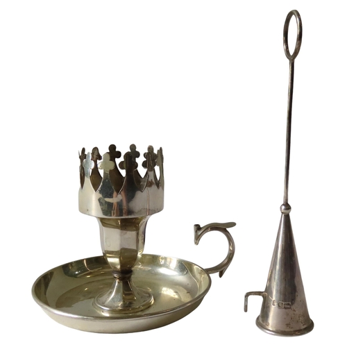 655 - AN EDWARDIAN SILVER CHAMBERSTICK, with a crown form sconce raised on an octagonal pillar, on a circu... 