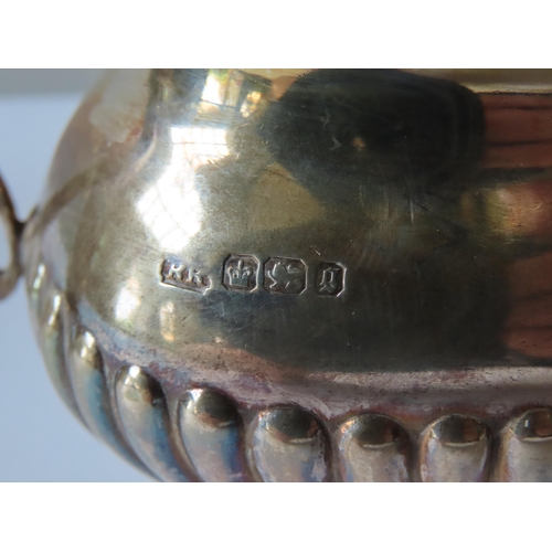 691 - A MIXED GROUP OF FOUR SILVER ITEMS, the lot comprised of the following:A monogrammed presentation mu... 