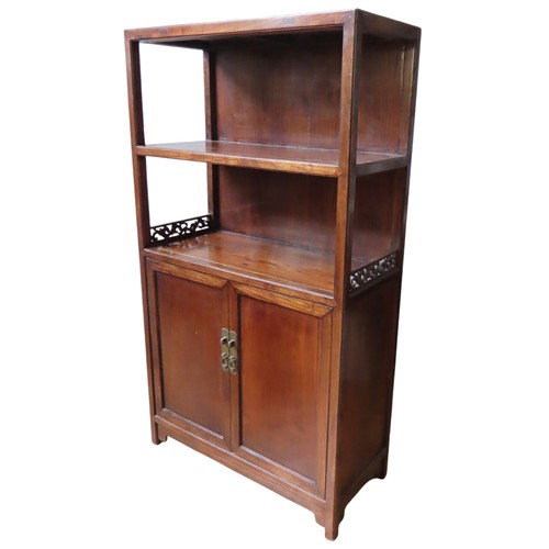 108 - A CHINESE HARDWOOD BOOKSHELF/CABINET, 20TH CENTURY, rectangular form, with two open shelves, the low... 