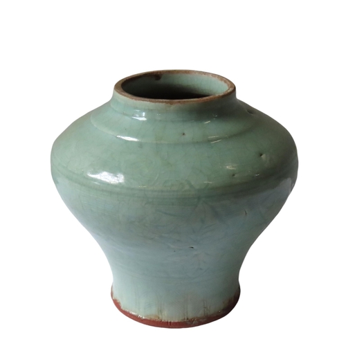 315 - A CHINESE 'QINGBAI' STYLE CELADON GLAZE BALUSTER VASE, the sides incised with foliate decoration abo... 