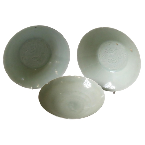 330 - A PAIR OF CHINESE 'QINGBAI' LOTUS FORM BOWLS, 20TH CENTURY, the interiors of the celadon glazed coni... 