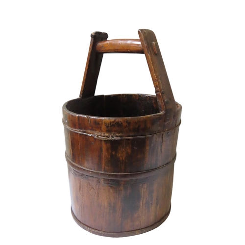 131 - A CHINESE IRON BOUND WOODEN WATER BUCKET, cylindrical form with handle59 cm high x 37 cm diamPROVENA... 