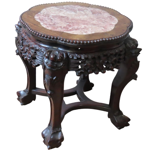 116 - A CHINESE MARBLE INSET HARDWOOD URN STAND, lobed form circular top with beaded edge, above an ornate... 