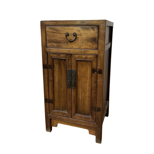 120 - A CHINESE HARDWOOD PANELLED SIDE CABINET, of square form, with a single frieze drawer over panelled ... 