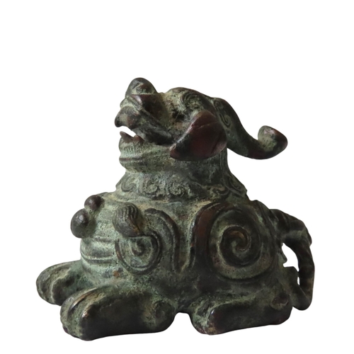 300 - TWO BRONZE JAPANESE YATATE AND A CHINESE BRONZE SCROLL WEIGHT, the weight modelled as a seated Ludua... 