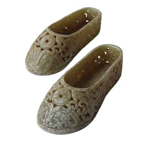 358 - A PAIR OF CHINESE HARDSTONE MINIATURE HANFU SHOES, the sides carved with dragons and pierced scroll ... 