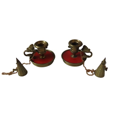 579 - A PAIR OF FRENCH 18TH CENTURY ORMULU DWARF CHAMBERSTICKS, turned tapering sconces on a vermillion la... 