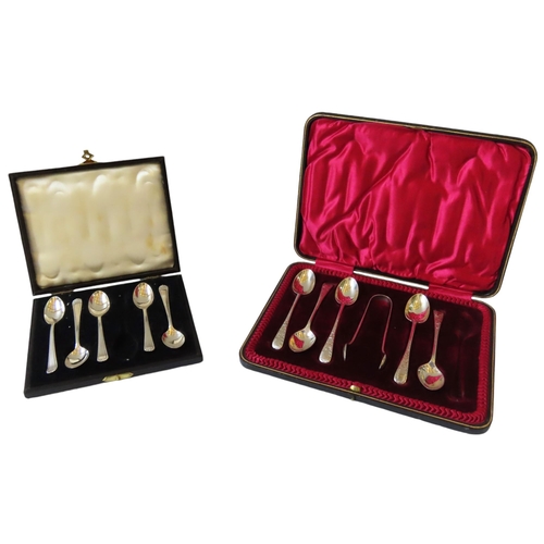 634 - TWO PART SETS OF SILVER TEA SPOONS, each boxed set lacking one spoon, the shell handled part set mar... 