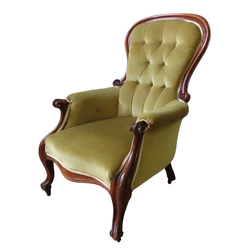 62 - A VICTORIAN MAHOGANY SPOON BACK ARMCHAIR, with elegant scrolling arms, the buttoned back panel and s... 