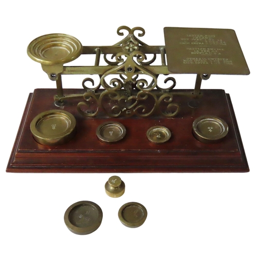 142 - 19TH CENTURY BRASS POSTAL SCALES, by S Mordan & Co, London, the letter pan inscribed with postal... 