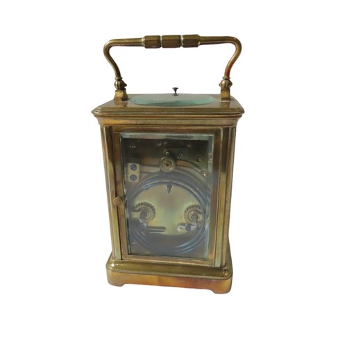 189 - A BRASS CASED REPEATING CARRIAGE CLOCK, EARLY 20TH CENTURY, the Anglais case with 2.5 inch enamelled... 