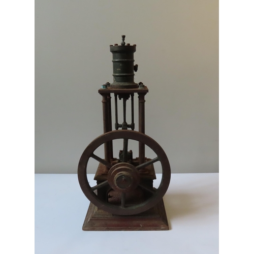 248 - AN ENGINEERED FOUR COLUMN VERTICAL STEAM ENGINE the top-mounted cylinder over four columns with larg... 