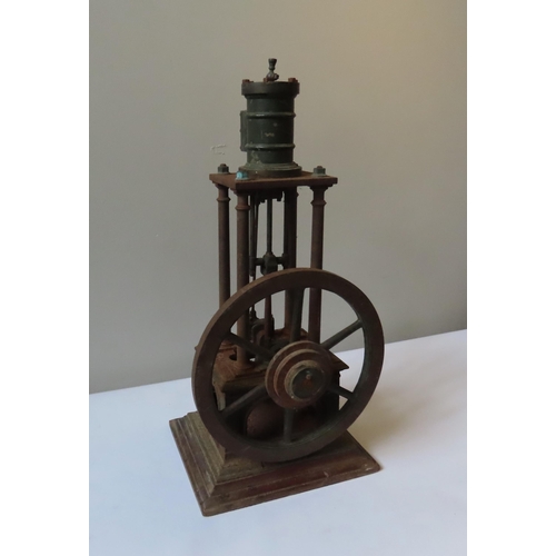 248 - AN ENGINEERED FOUR COLUMN VERTICAL STEAM ENGINE the top-mounted cylinder over four columns with larg... 