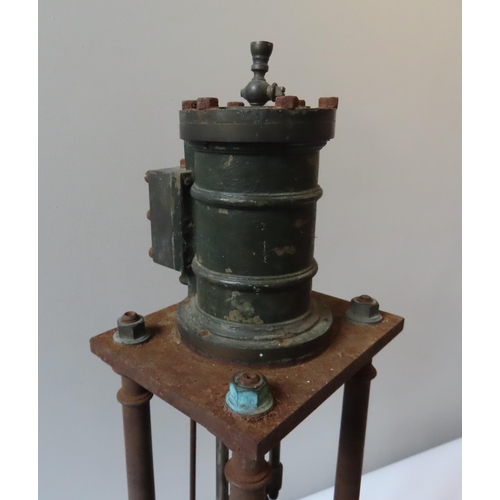 248 - AN ENGINEERED FOUR COLUMN VERTICAL STEAM ENGINE the top-mounted cylinder over four columns with larg... 