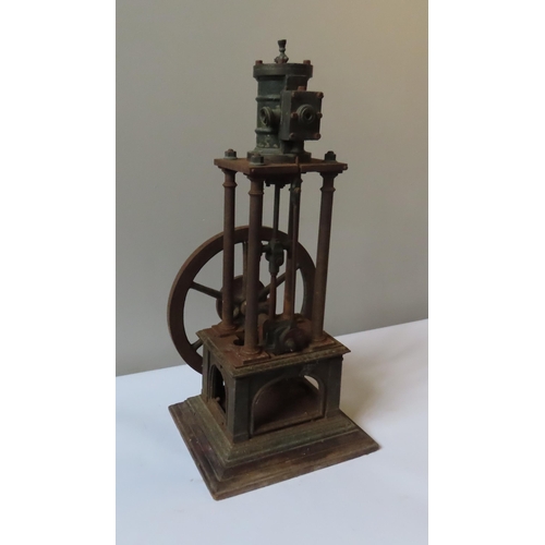 248 - AN ENGINEERED FOUR COLUMN VERTICAL STEAM ENGINE the top-mounted cylinder over four columns with larg... 