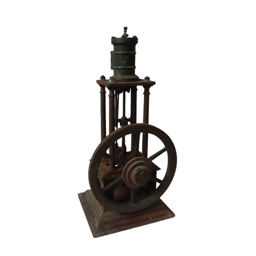 248 - AN ENGINEERED FOUR COLUMN VERTICAL STEAM ENGINE the top-mounted cylinder over four columns with larg... 