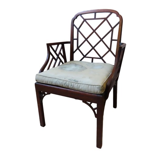 86 - A REGENCY MAHOGANY COCKPEN OPEN ARMCHAIR, in the Chinese Chippendale style, break arch top rail abov... 