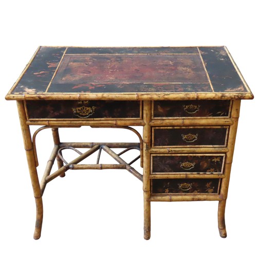 111 - A 19TH CENTURY BAMBOO AND BLACK LACQUER DESK, the rectangular top with a leather inset writing surfa... 