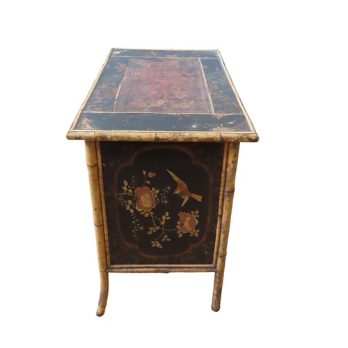 111 - A 19TH CENTURY BAMBOO AND BLACK LACQUER DESK, the rectangular top with a leather inset writing surfa... 