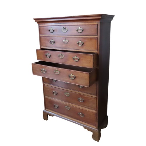 50 - A 19TH CENTURY MAHOGANY CHEST OF DRAWERS, comprised of an ogee moulded cornice over seven graduated ... 