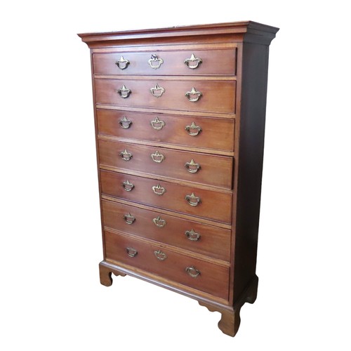 50 - A 19TH CENTURY MAHOGANY CHEST OF DRAWERS, comprised of an ogee moulded cornice over seven graduated ... 