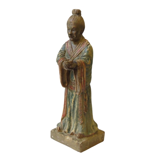 334 - A CARVED WOODEN CHINESE POLYCHROME FIGURE, LATE QING DYNASTY, 19TH CENTURY, of a robed male attendan... 